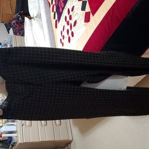 A pair of black/gold pants size 10. Made by CHARTER CLUB Pant shop. Classic fit.